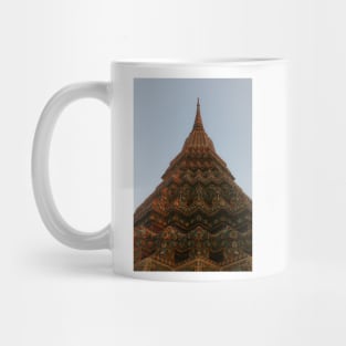 First low angle view of a Buddha stupa reaching symmetrical in the clear sky. Mug